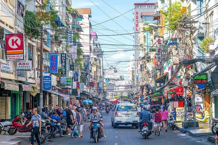 Small group Saigon Inside Out by Motorbike for 3 Hours