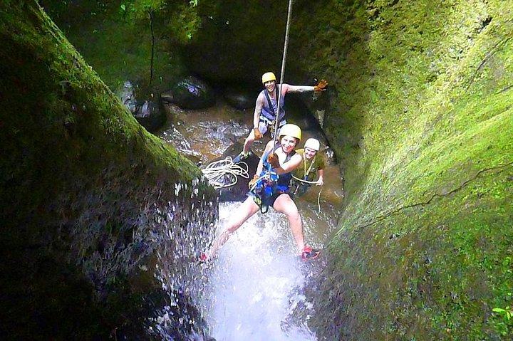 Canyoning in waterfalls and Zipline cable near La Fortuna