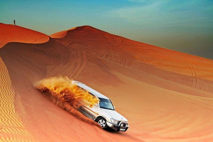 Morning Dubai Desert Safari with Camel Ride and Sand boarding