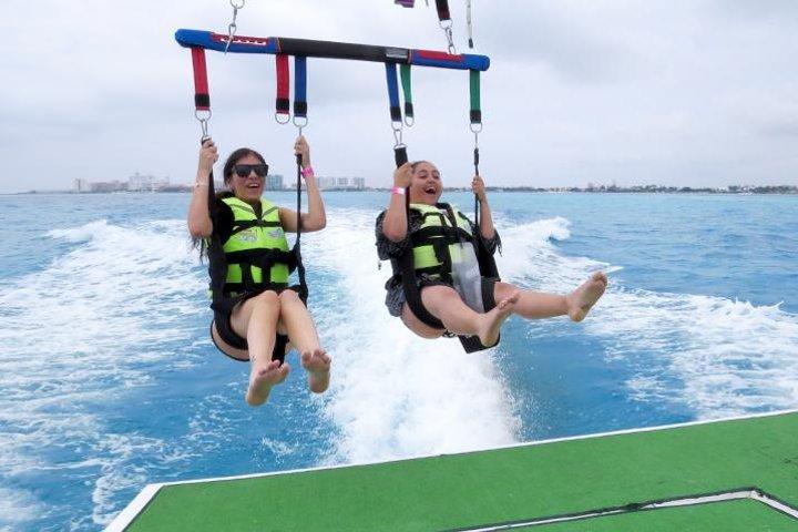 Fly Above Cancun Bay: Parasailing Experience
