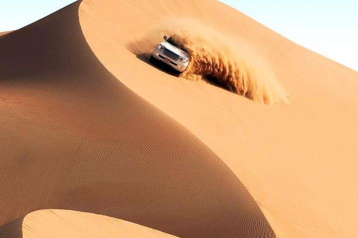 Dubai Desert Safari with Quad Bike & Dune Bashing & Camel Ride & BBQ Dinner