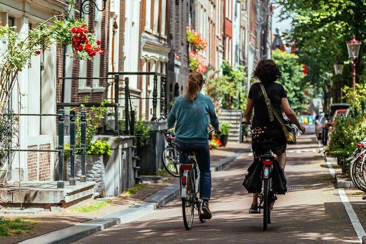 Amsterdam PRIVATE Bike Tour With Locals: Bike & Local Snack Included