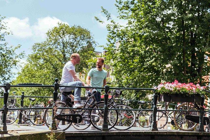 Amsterdam PRIVATE Bike Tour With Locals: Bike & Local Snack Included