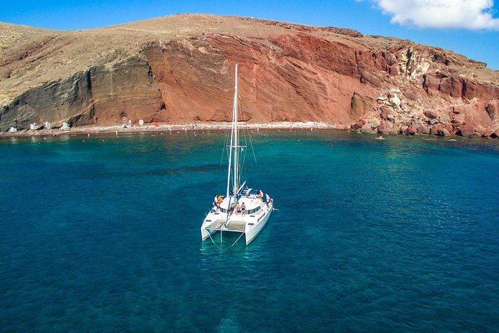 Santorini Half Day Catamaran Private Cruise incl. Meal, Drinks & Free Transport