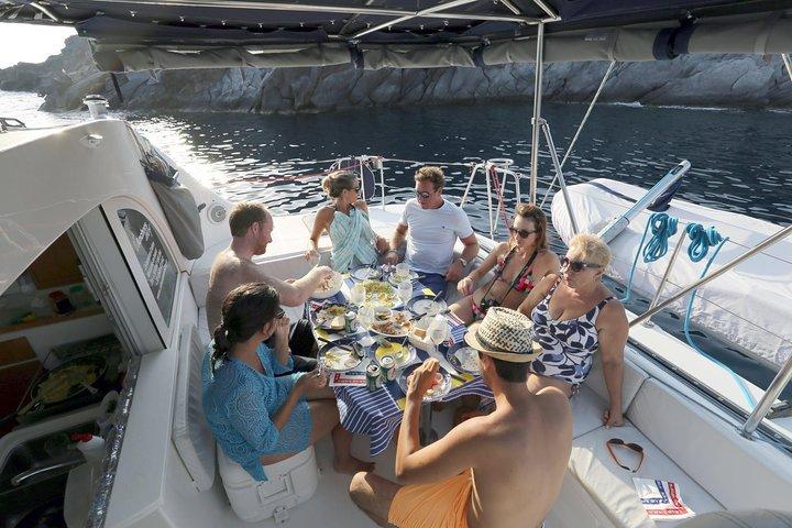 Santorini Half Day Catamaran Private Cruise incl. Meal, Drinks & Free Transport