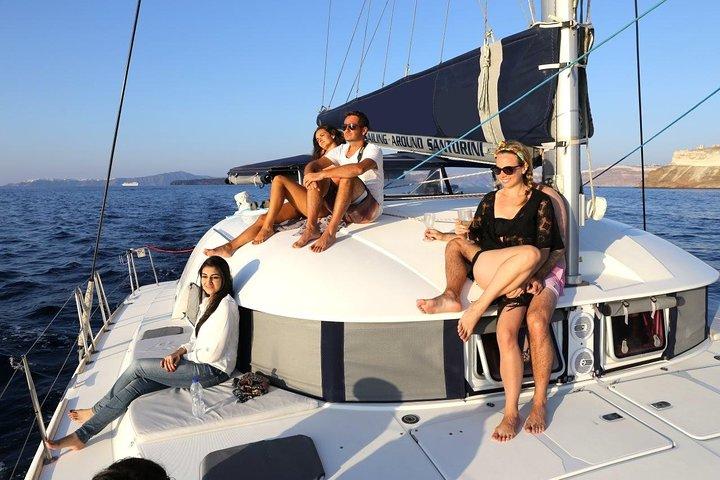 Santorini Half Day Catamaran Private Cruise incl. Meal, Drinks & Free Transport