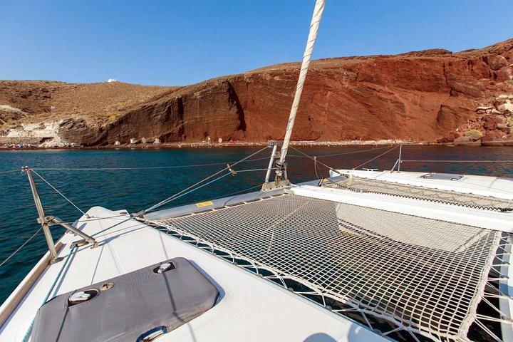 Santorini Half Day Catamaran Private Cruise incl. Meal, Drinks & Free Transport