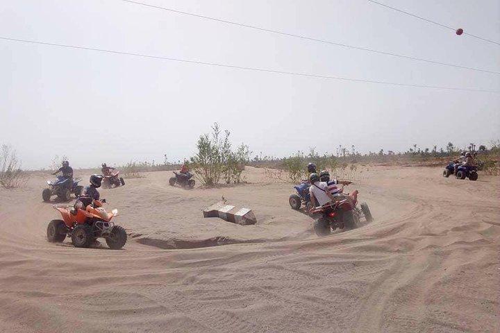 Marrakech quad biking tour in palm grove desert of marrakech
