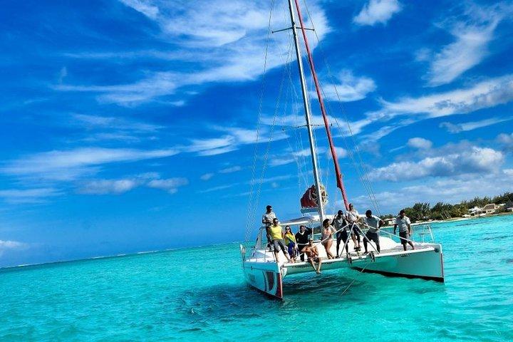 Catamaran Adventure Full Day: Ile aux cerfs,GRSE Waterfall,Snorkeling &BBQ Lunch