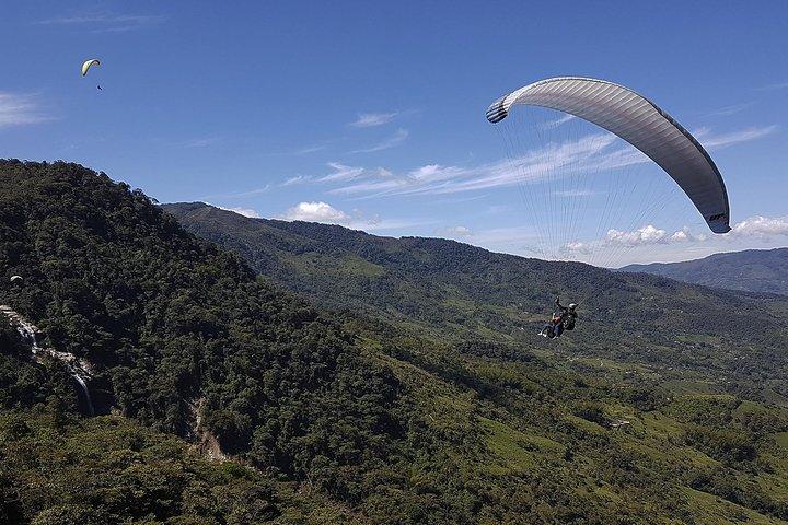 PARAGLIDING over giant waterfalls private tour (optional Guatape) from Medellin