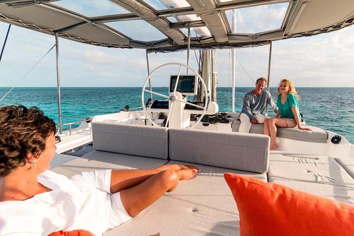 Santorini Luxury Sailing Catamaran Cruise with BBQ, Drinks and Transfer