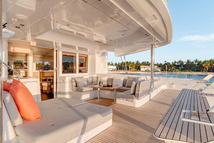 Santorini Luxury Sailing Catamaran Cruise with BBQ, Drinks and Transfer