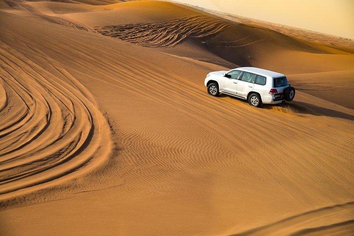 Dubai Evening Desert Safari: Dune Bashing, Camel Ride & BBQ