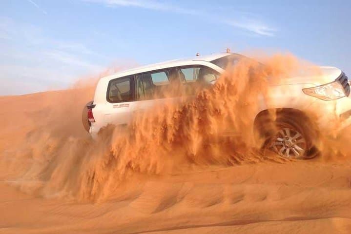 Dubai Desert Safari - Dune Bashing, Live Shows, Camel Ride & BBQ