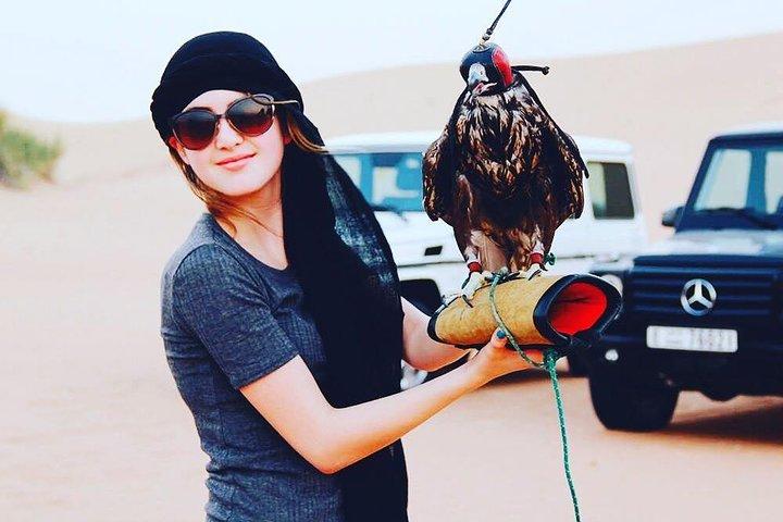 Arabian Desert Safari with BBQ Dinner Camel Ride, Sand Boarding