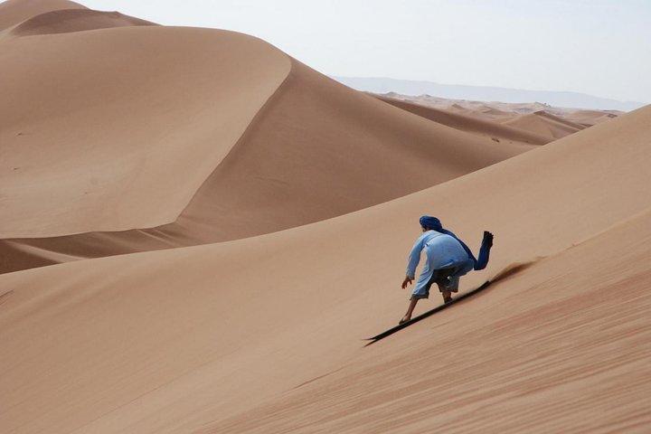 Private Desert Sandboarding Camel riding tour