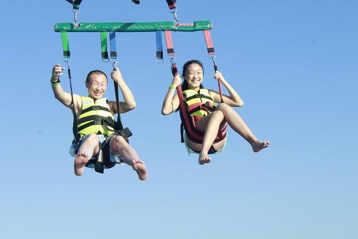 Fly Above Cancun Bay: Parasailing Experience