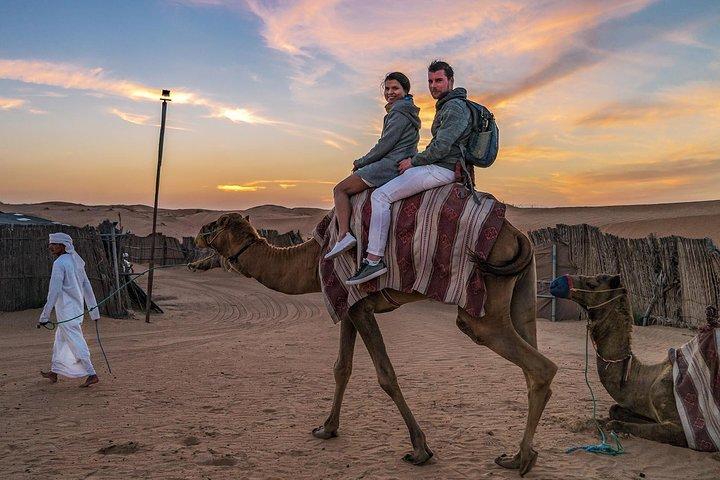Dubai Evening Desert Safari, Camel Ride, Sandboarding & BBQ Dinner