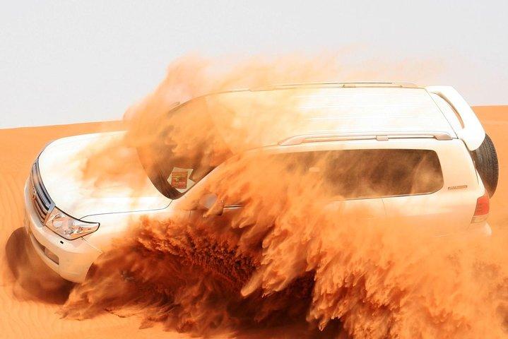 Morning Dubai Desert Safari with Sand boarding and Camel Ride