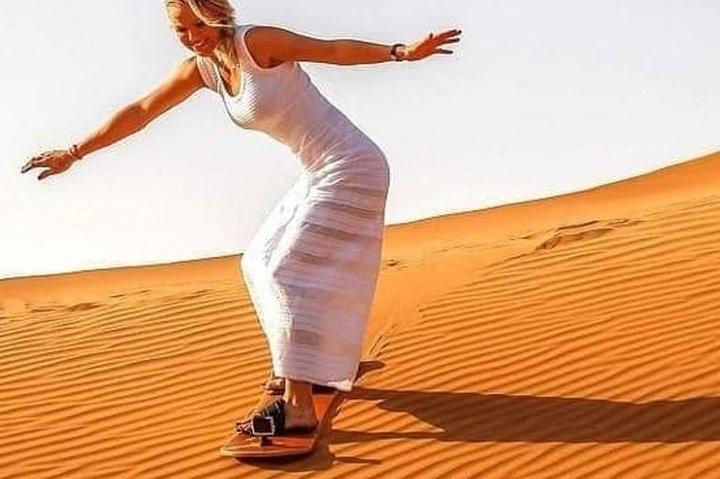 Desert Safari : free Sandboarding, Camel Riding,BBQ Dinner + Live activities
