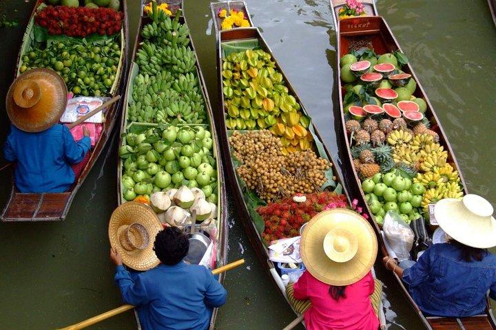 Maeklong Railway & Damnoen Saduak Floating Market Half-Day Tour