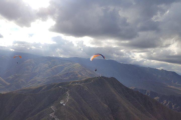 Paragliding free flight experience over the pre-range