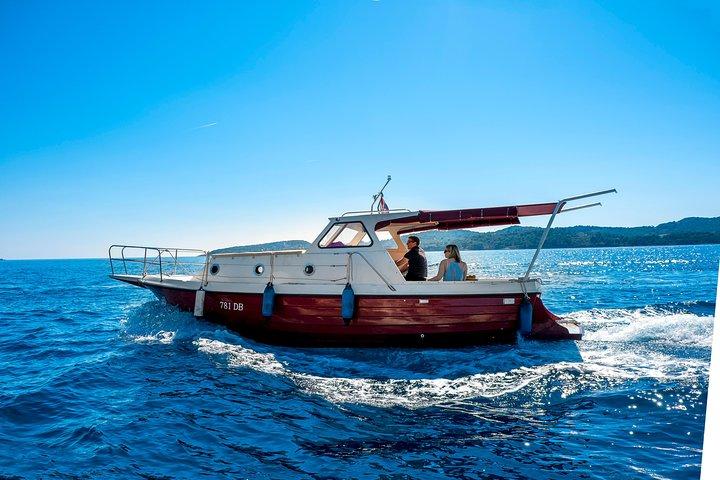 Private boat tour- explore the islands, find hidden caves and try snorkelling