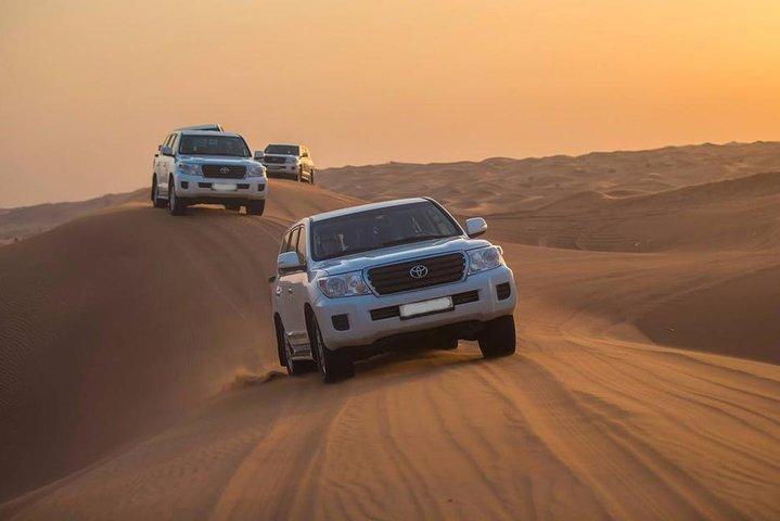 Private - Camel Trekking in Dubai with Morning Dune Bashing and Sand Boarding
