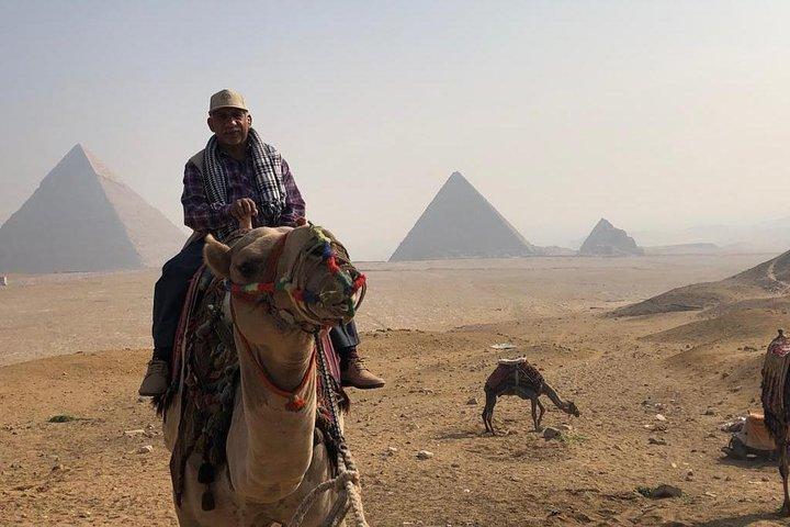 Half day with pyramids and Sphinx with riding a Camel