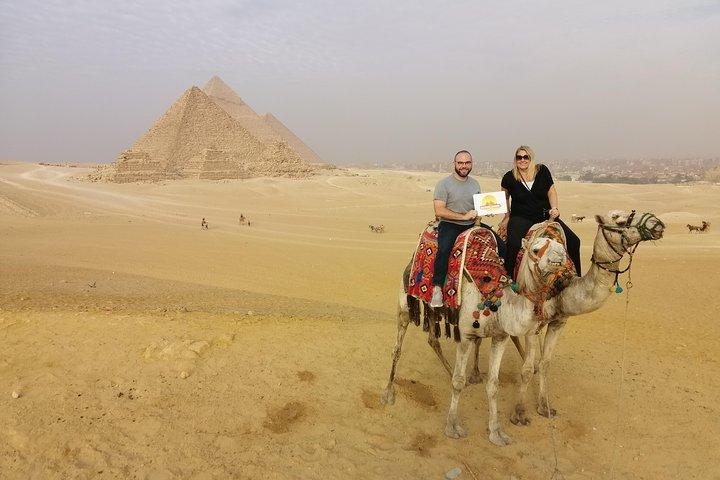 Sunset at Giza pyramids by camel