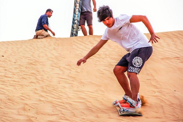 Abu Dhabi Morning Desert safari with Camel ride & Sand boarding