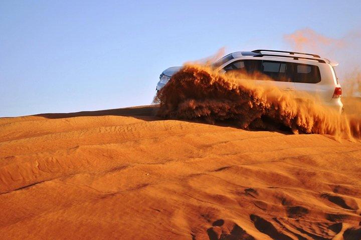 Abu Dhabi Morning Desert safari with Camel ride & Sand boarding