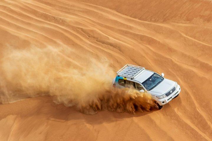 Abu Dhabi Morning Desert safari with Camel ride & Sand boarding