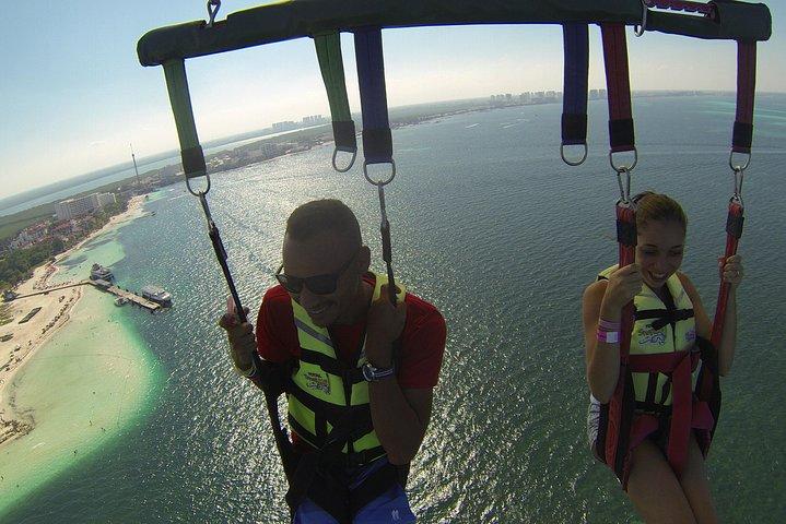 Fly Above Cancun Bay: Parasailing Experience