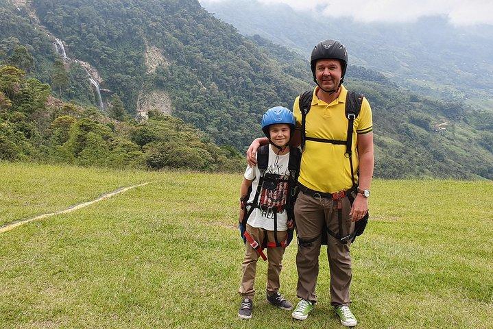 PARAGLIDING over giant waterfalls private tour (optional Guatape) from Medellin