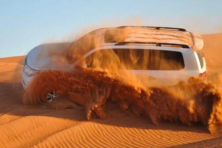 Red Dunes Desert Safari, Sand Board, Camel Ride with BBQ Dinner