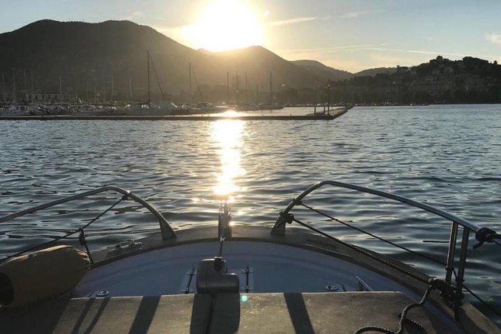 Romance in Cinque Terre: a boat trip at sunset, aperitif onboard