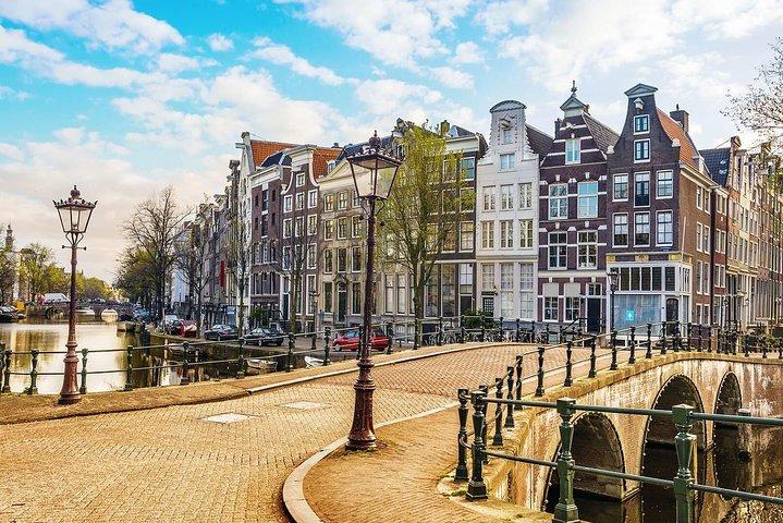Airport Transfer: Schiphol Airport AMS to Amsterdam by Luxury Van