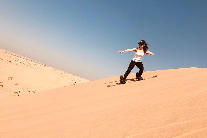 Abu Dhabi Desert safari with BBQ Dinner,Sandboarding & Camel ride