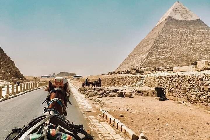 Enjoy our Tour around the Pyramids Riding a Camel