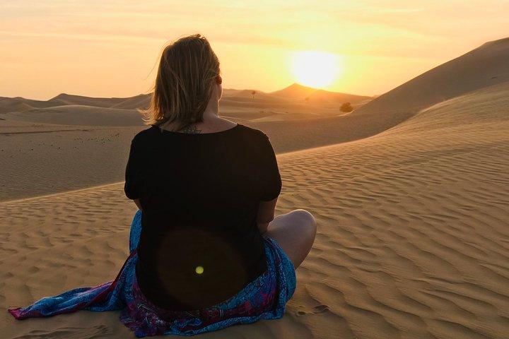 Abu Dhabi Desert safari with BBQ Dinner,Sandboarding & Camel ride
