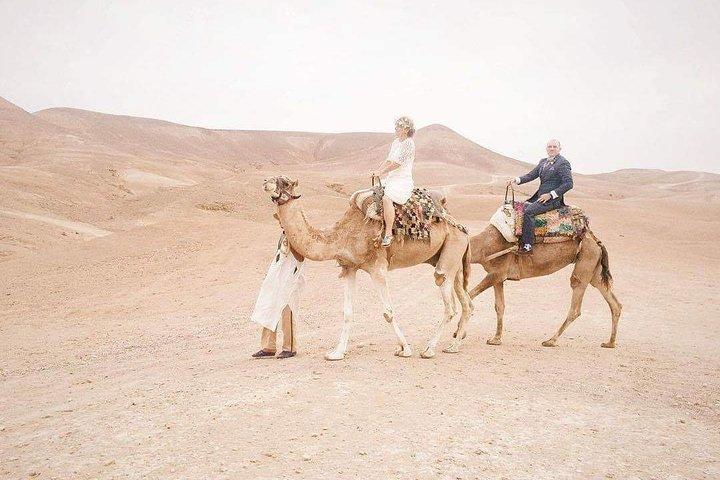Camel ride at sunset in Agafay desert