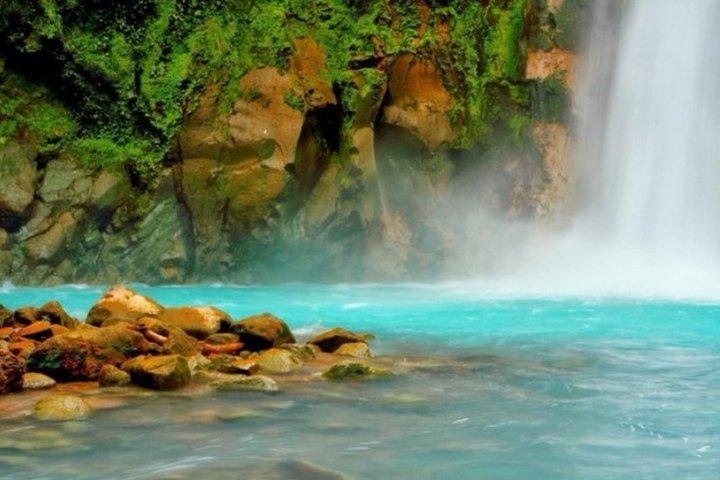 Rio Celeste Waterfall at Tenorio Volcano and Sloth Watching Tour From San Jose