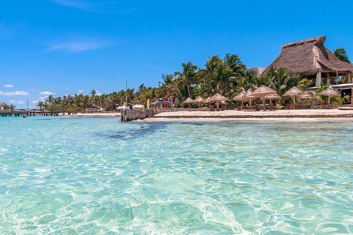 The best tour to Isla Mujeres Catamaran, open bar& lunch included