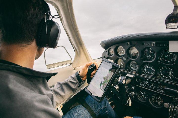 Fly above Normandy's hallowed coastline in a private plane