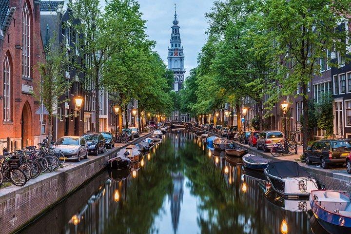 Airport Transfer: Schiphol Airport AMS to Amsterdam by Luxury Van