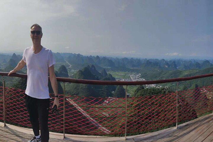 1-Day Tour:Yangshuo Yulong Bamboo Boat and Ruyi Peak Cable Car from Guilin Hotel