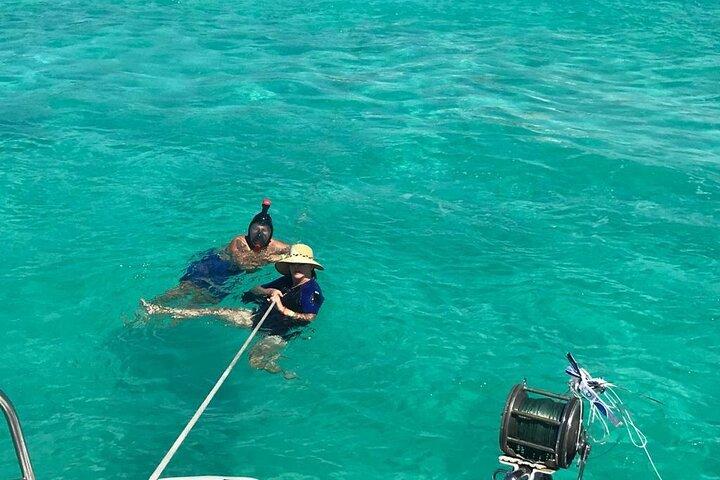 Catamaran to Isla Mujeres, Open bar, buffet, Beach Club Included