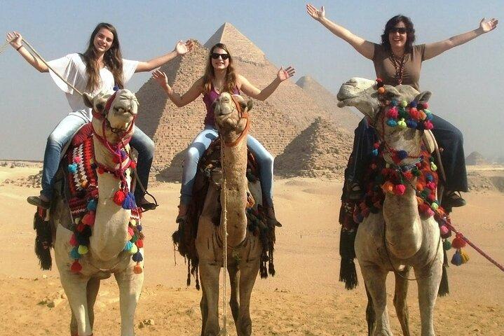 Half Day tour to Giza Pyramids with Camel ride and lunch