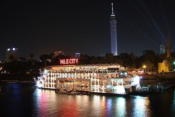 Enjoy a dinner on the boat in the River Nile.